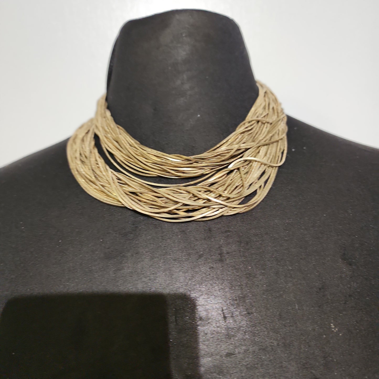 28 Strand Gold Tone Necklace