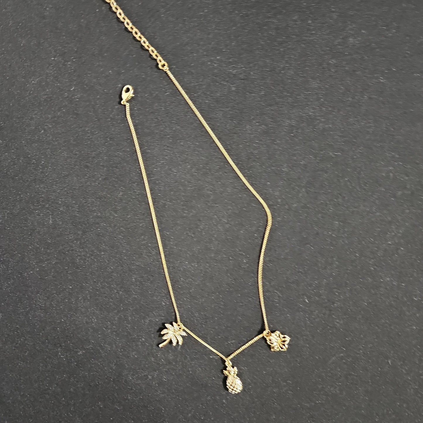 3 Charm Gold Tone Necklace